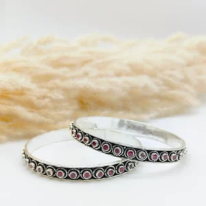 Antique Silver Bangle with red stones.