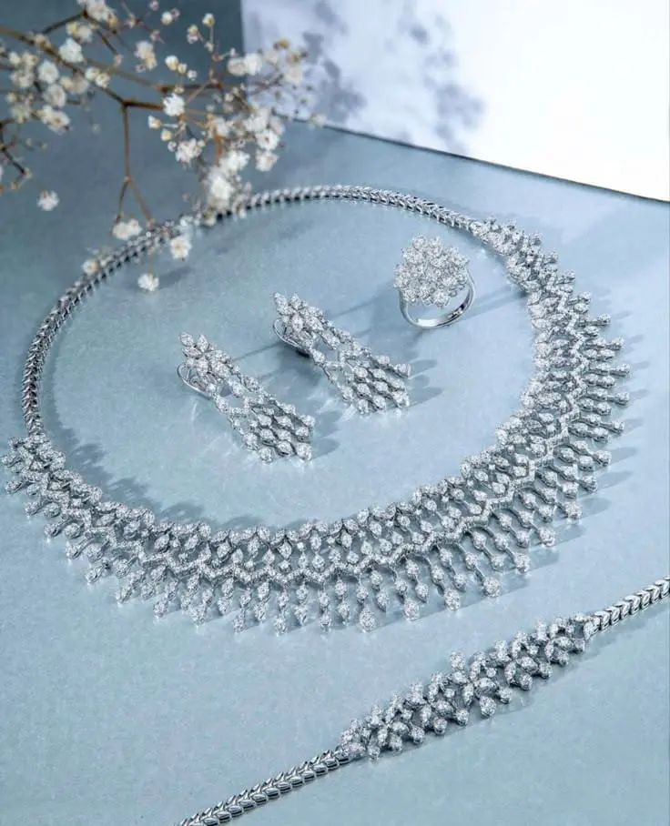 Silver Shop in Kannur silver necklace, earrings, ring and bracelet combo.