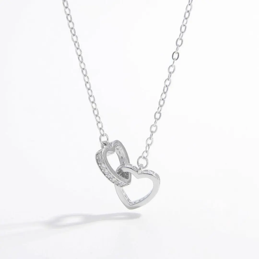 Silver heart shaped pendant necklace.